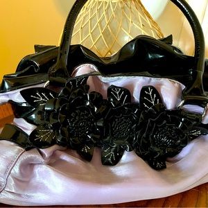 No name brand just a beautiful purple purse